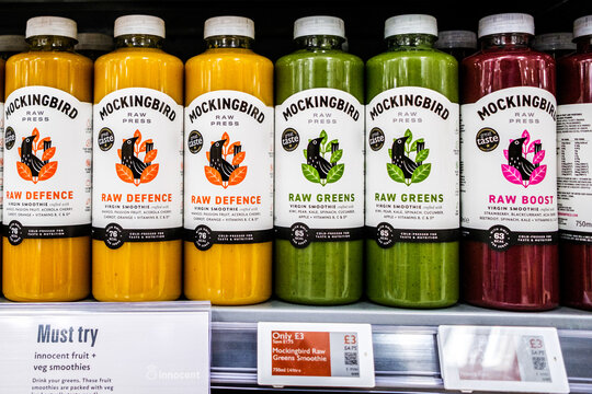 Clsoe-Up Of A Waitrose Display Of Bottles Of Mockingbird Raw Press Vegetable Smothies With A Price Tag