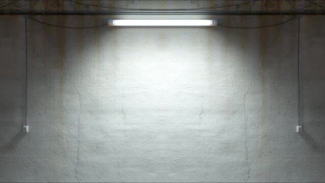 Fluorescent light flickering on an old cracked concrete wall