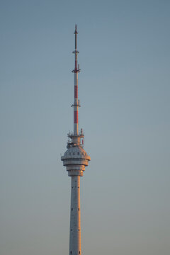 Isolated Baku TV Tower spire at sunset with sky copy space