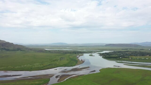Stora Laxa - Glacial water and clear mountain water meet near the village Laugaras in Iceland
