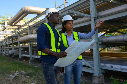 Engineers are inspecting natural gas pipelines in the natural gas and oil industrial park.