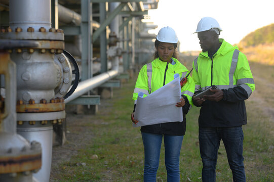 Engineers are inspecting natural gas pipelines in the natural gas and oil industrial park.