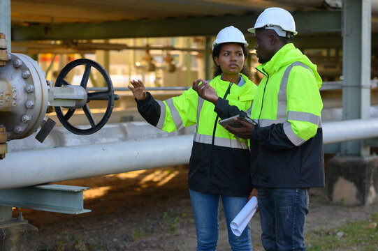 Engineers are inspecting natural gas pipelines in the natural gas and oil industrial park.