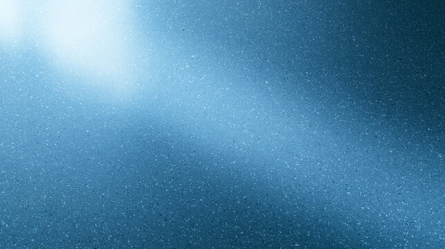 Abstract Blue Textured Background with Diagonal Light Beam