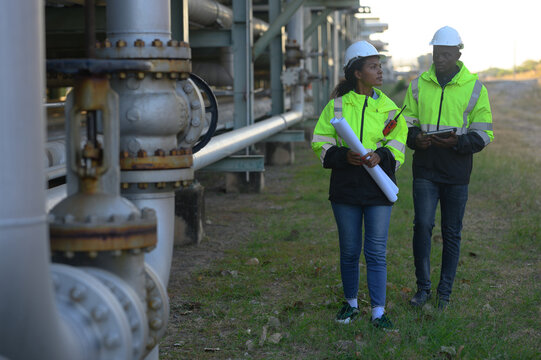 Engineers are inspecting natural gas pipelines in the natural gas and oil industrial park.