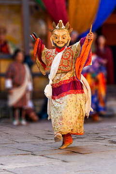 Bumthang in Bhutan, at the yearly festival in the monastery of Jakar. A monk is dancing in his colourful traditional dress and mask