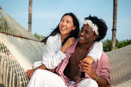 Couple enjoying their tropical vacation with peace of mind, secured by reliable travel insurance