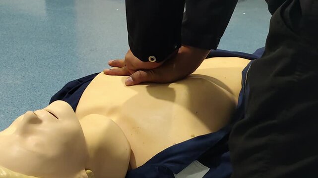 CPR Training ,Emergency and first aid class on cpr doll, Cardiopulmonary resuscitation, One part of the process resuscitation on unconscious person.