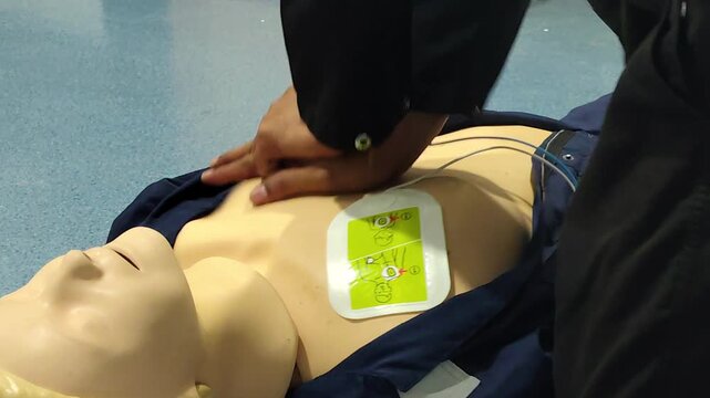 CPR Training ,Emergency and first aid class on cpr doll, Cardiopulmonary resuscitation, One part of the process resuscitation on unconscious person.