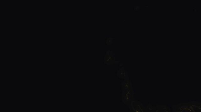 Magical glitter ribbon animation, black background, glowing fairy dust particles, sparkling starlight swirl, luminous magic trail, elegant shimmer overlay, cinematic 4k motio