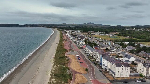 Aerial video of Pwllheli promenade. Pwllheli  is a market town and community on the Llŷn Peninsula  in Gwynedd, north-west Wales. It had a population  Pwllheli is the place where Plaid Cymru was found