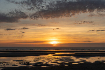 Fototapeta premium Golden Sunset over Quend-Plage-les-Pins, Opal Coast, France. 