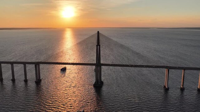 Sunset Cable Stayed Bridge In Manaus Amazonas Brazil. Birds Eye View Of Suspension Bridge With Cars Driving Across. Sunrise Nature Travel. Rainforest River. Manaus Amazonas.
