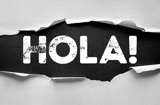 Torn paper effect revealing the word HOLA! in bold distressed font. Spanish greeting concept for communication, friendship, culture, travel, language learning, social connection, and positive message