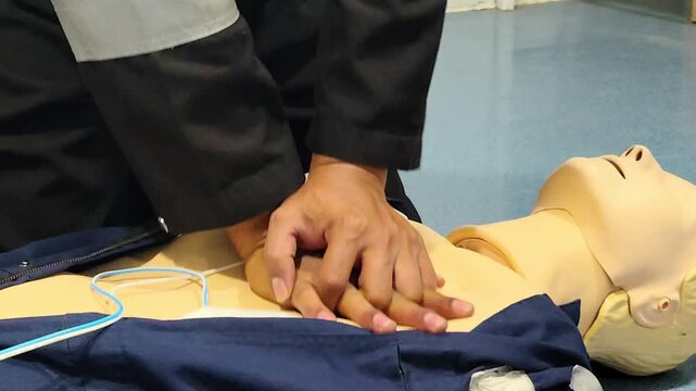 CPR Training ,Emergency and first aid class on cpr doll, Cardiopulmonary resuscitation, One part of the process resuscitation on unconscious person.