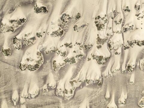 Sand hummocks caused by dwarf shrubs. Aerial view. Drone shot. Namib Desert, Skeleton Coast, Namibia