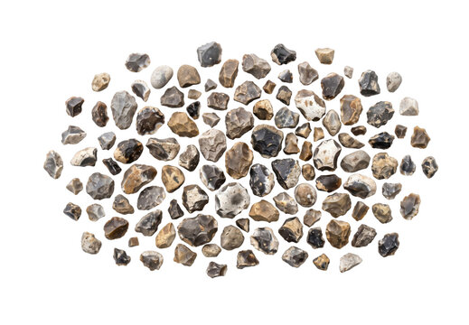 Collection of rough, natural flint stones scattered on a white background