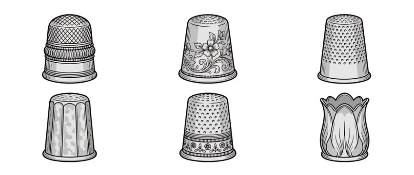 Collection of vintage sewing thimbles with intricate designs