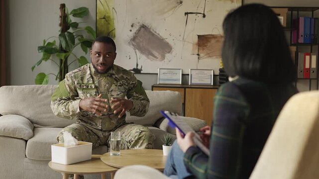 African American military veteran discusses mental health with psychologist