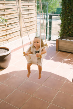Toddler On Swing