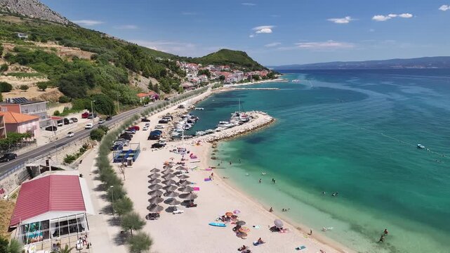 Beach Umbrellas And Adriatic Sea On The Podstrana Coast, Croatia