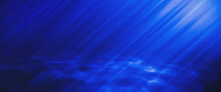 Blue foggy light rays abstract background texture