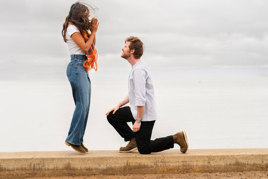 excited couple marriage proposal 