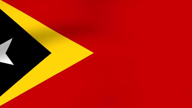 Waving flag of East Timor featuring red yellow black and white colors