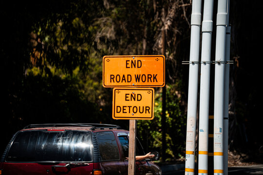 End road work and detour signs signal return to normal traffic flow