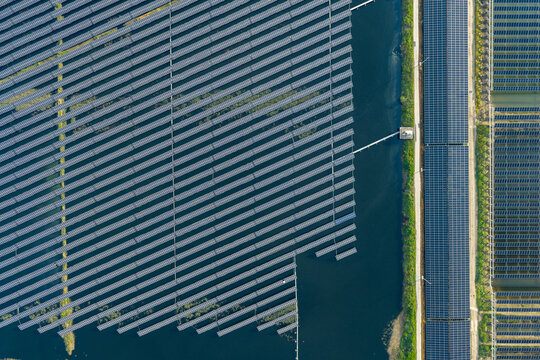  vast floating solar farm and wind turbines over water