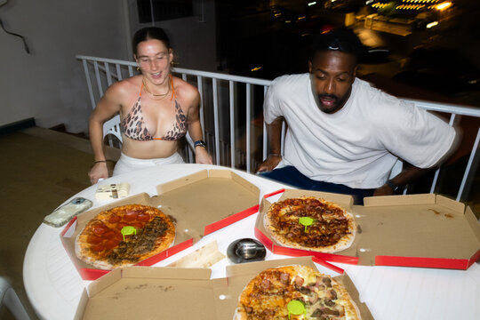 Friends excited over pizza