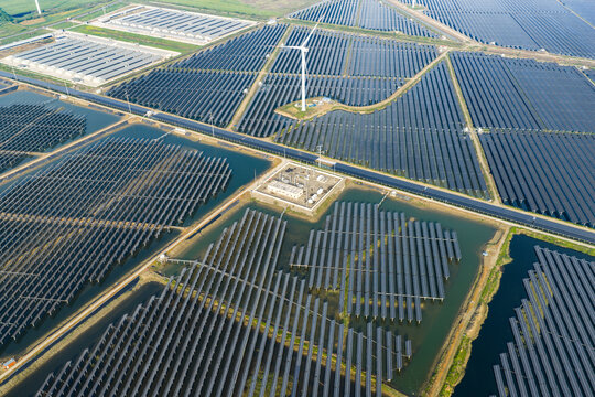 vast floating solar farm and wind turbines over water