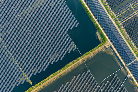  vast floating solar farm and wind turbines over water
