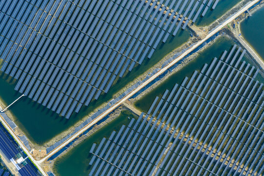  vast floating solar farm and wind turbines over water