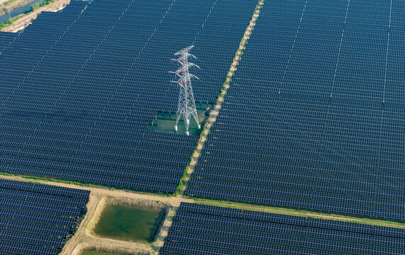  vast floating solar farm and wind turbines over water