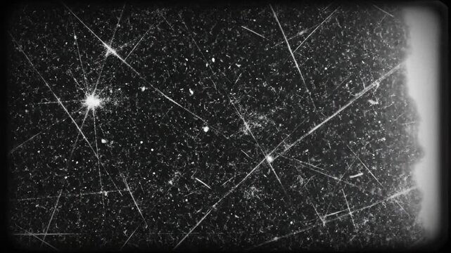 Distressed vintage film grain overlay with scratches and dust texture