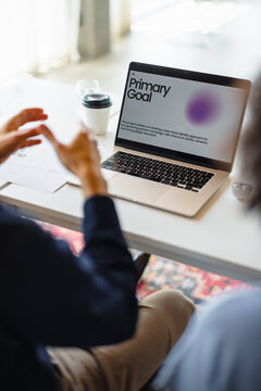 Discussion About Primary Goal During a Meeting in an Office Space