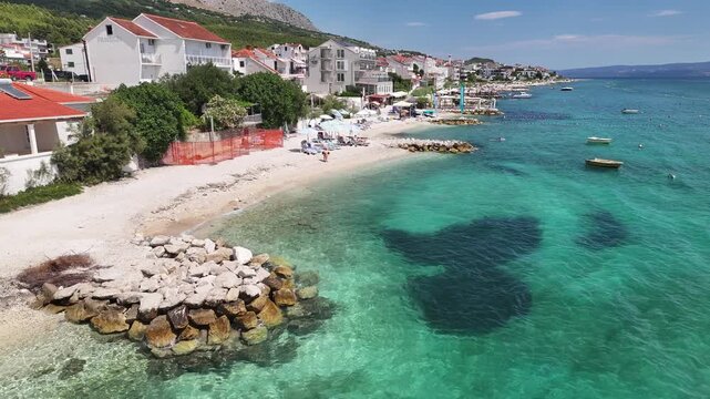 Paddleboarder Along The Podstrana Coast, Croatia, Aerial View