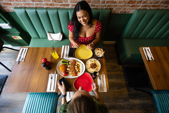 Overhead view of friends dining on Turkish food