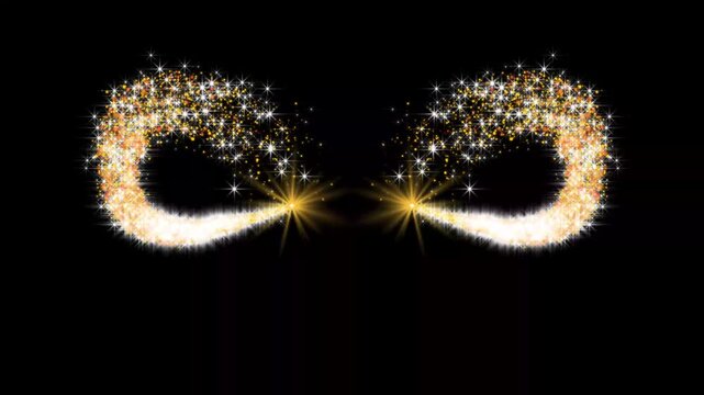 Golden glowing sparkle light trails crossing and forming a symmetrical magical pattern on black background