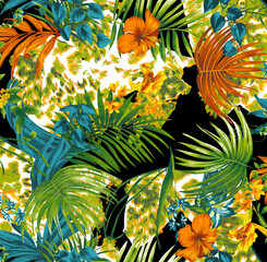 Vibrant Tropical Leaves and Ferns in Lush Green and Autumn Colors Close-Up © Wolfworker