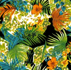 Vibrant Tropical Leaves and Ferns in Lush Green and Autumn Colors Close-Up © Wolfworker