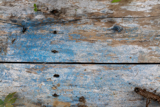 Weathered Blue Paint Fading Across Old Wooden Planks With Texture