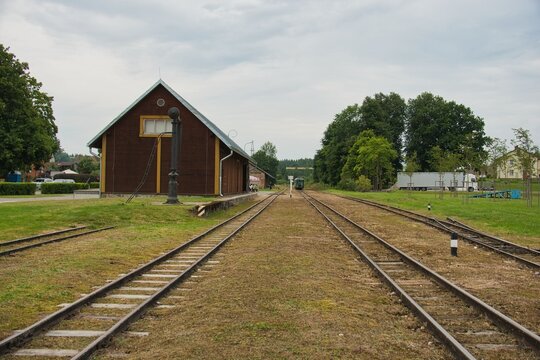 Historic Wooden Railway Station and Train Tracks