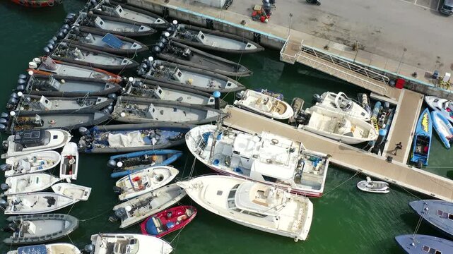 Aerial view of a large group of drug boats captured by the Spanish Customs Service coast guard in the Strait of Gibraltar, Spain. 