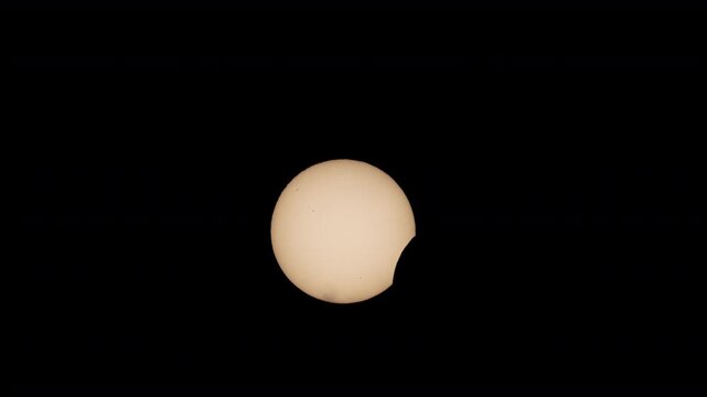 moment of totality during the 2026 solar eclipse when the moon cast a shadow over the sun 