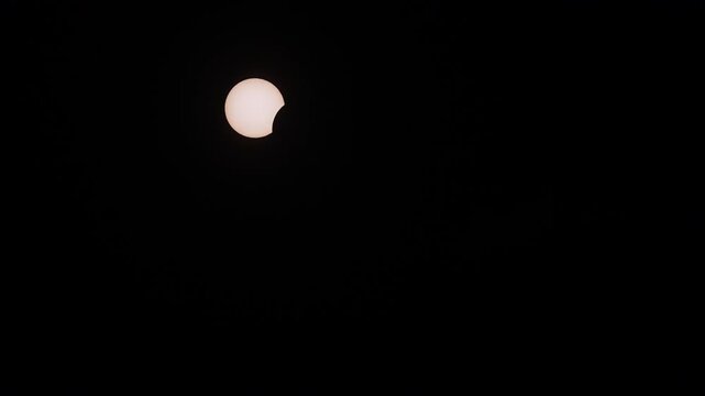 moment of totality during the 2026 solar eclipse when the moon cast a shadow over the sun 