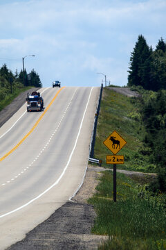 Canadian road with a &lsquo;Beware of Moose&rsquo; sign