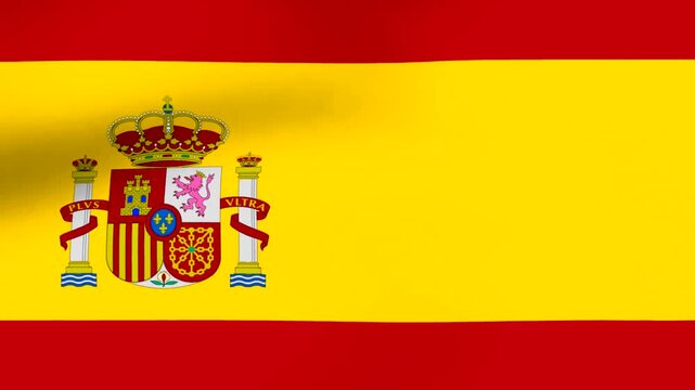Waving flag of Spain with official national coat of arms centered on the yellow and red field