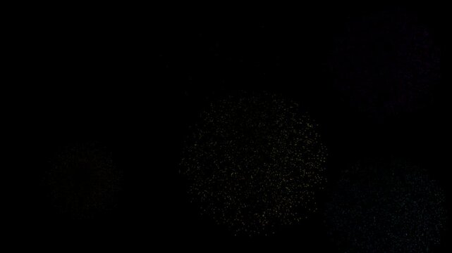 Abstract firework starburst particle explosion on black background for motion graphics.
